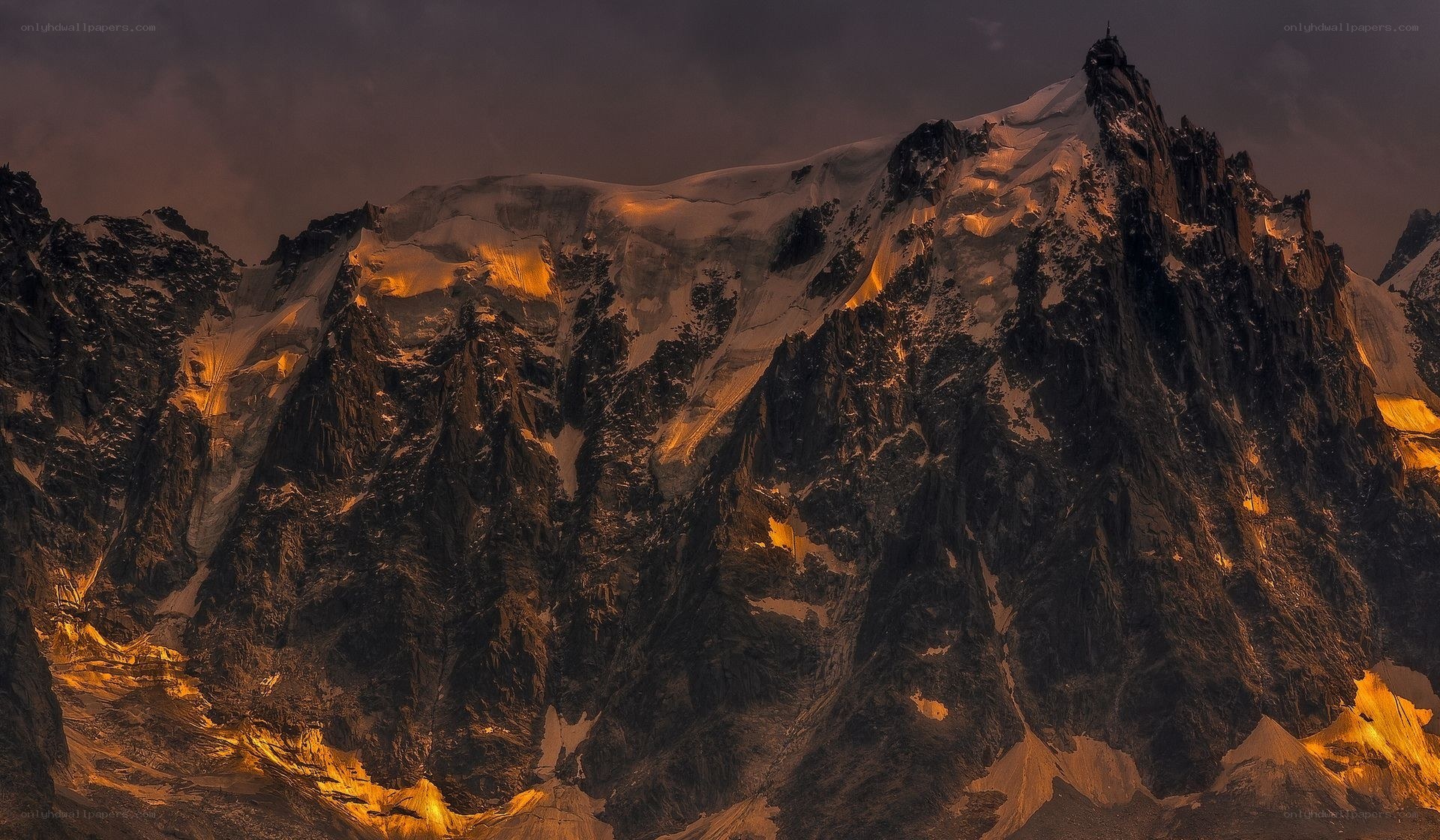 Sunset on a snow-capped mountain