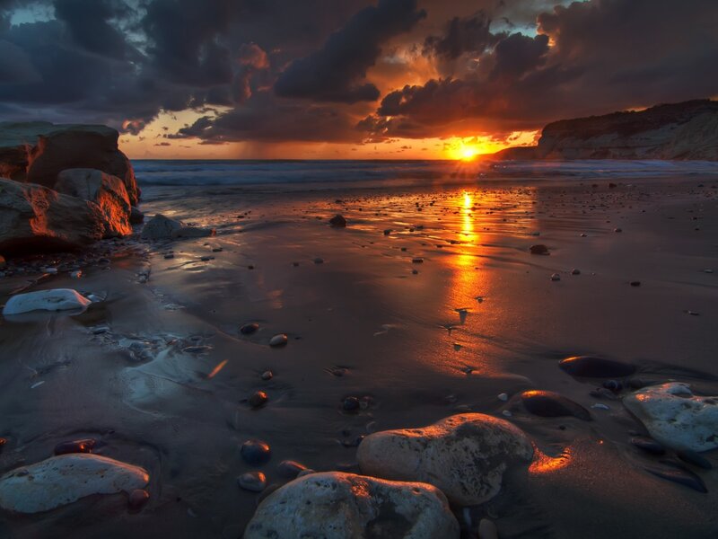 Sunset on Rocky Beach — Orange, Dramatic, Photograph, Ocean, Rocks, Clouds