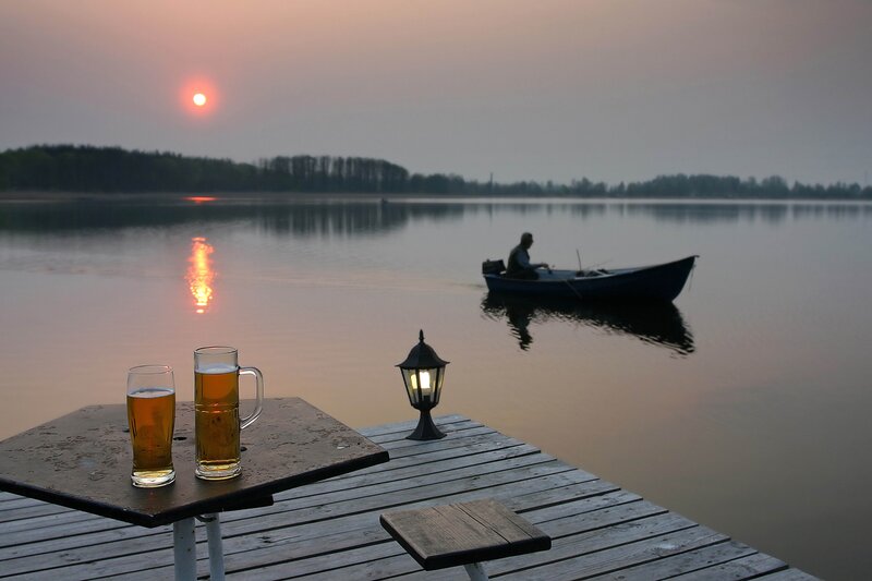 Sunset on the lake with beer