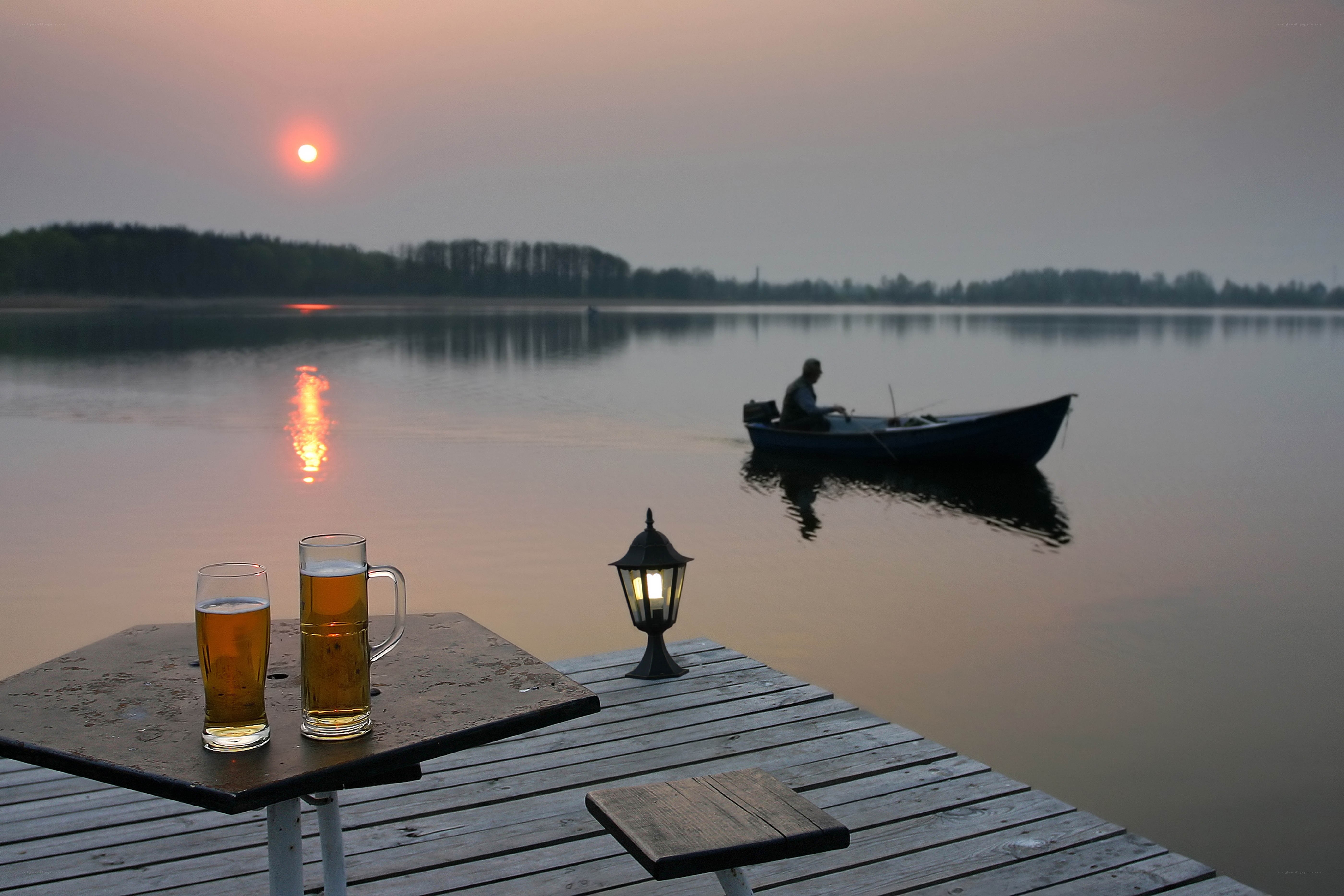 Sunset on the lake with beer