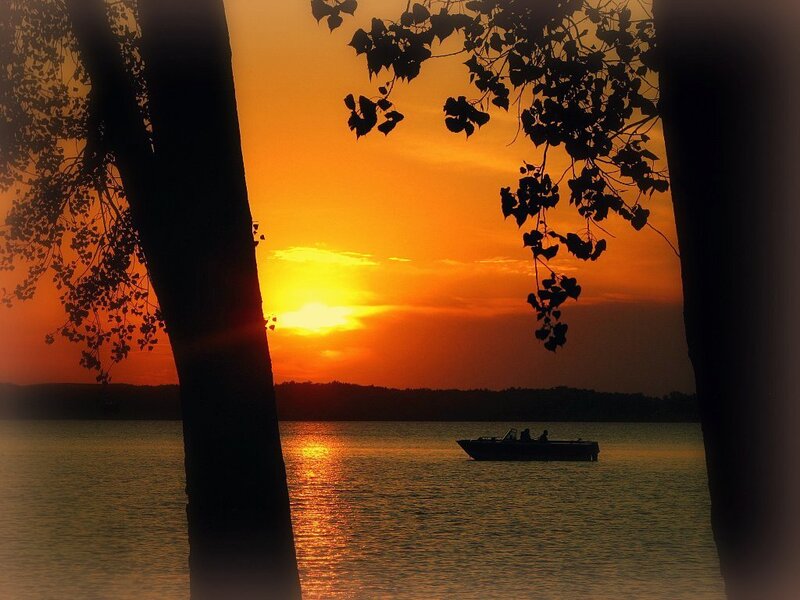 Sunset on the lake with boat