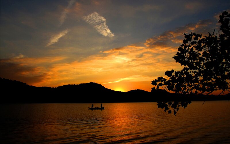 Sunset on the lake with boat