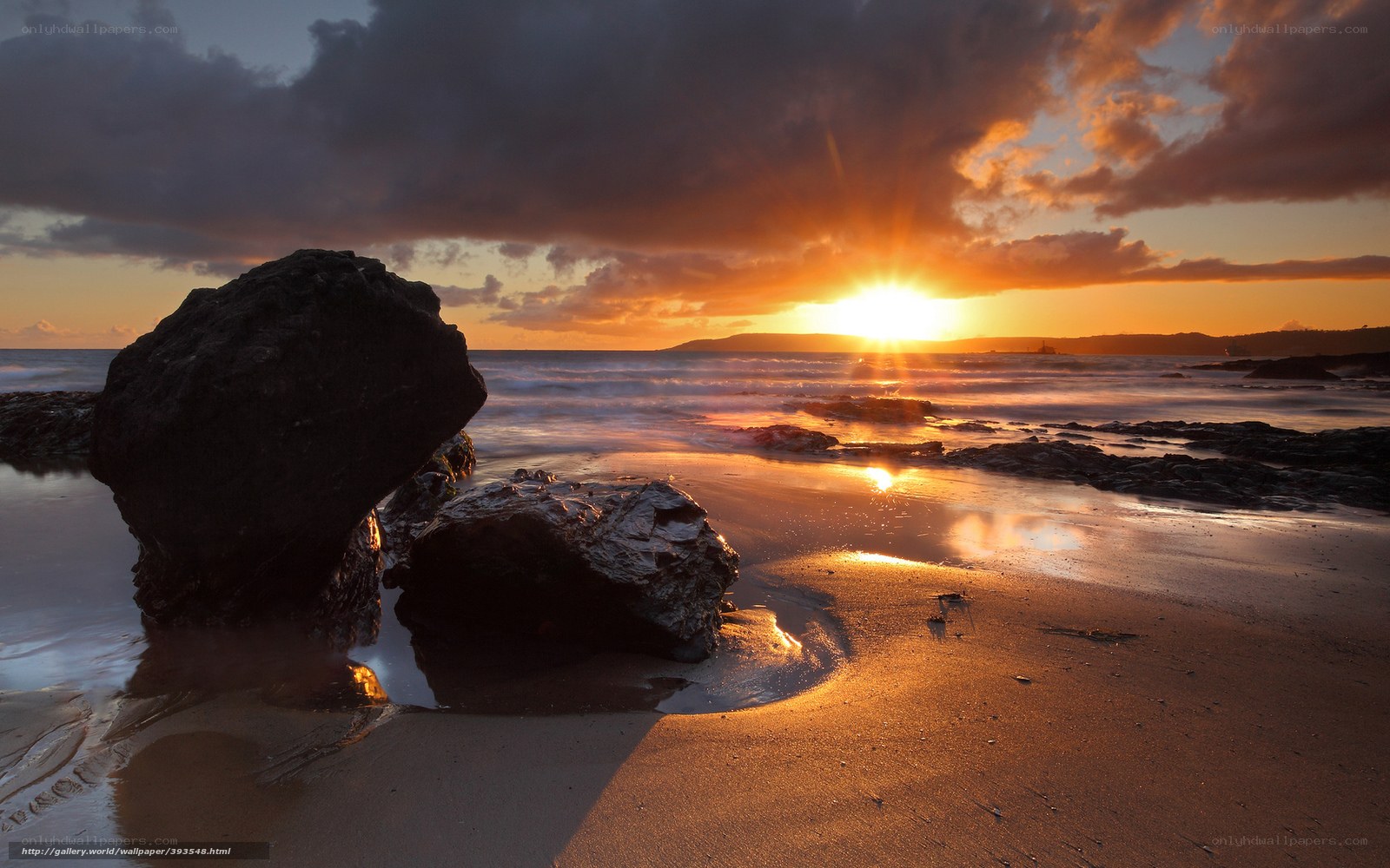 Sunset on the rocky beach