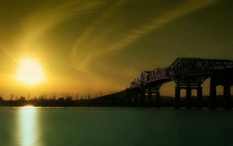 sunset over a bridge