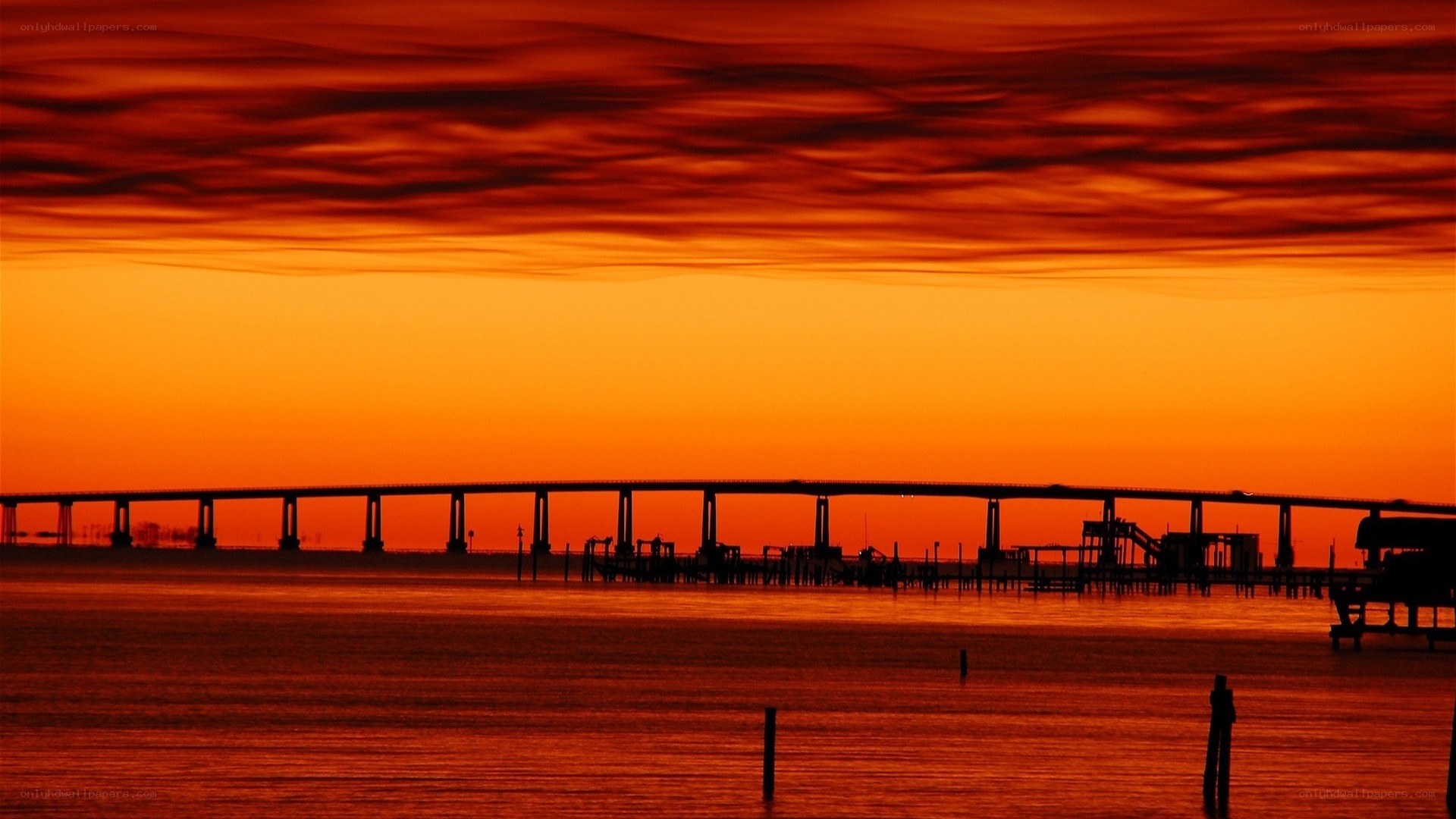 sunset over a bridge