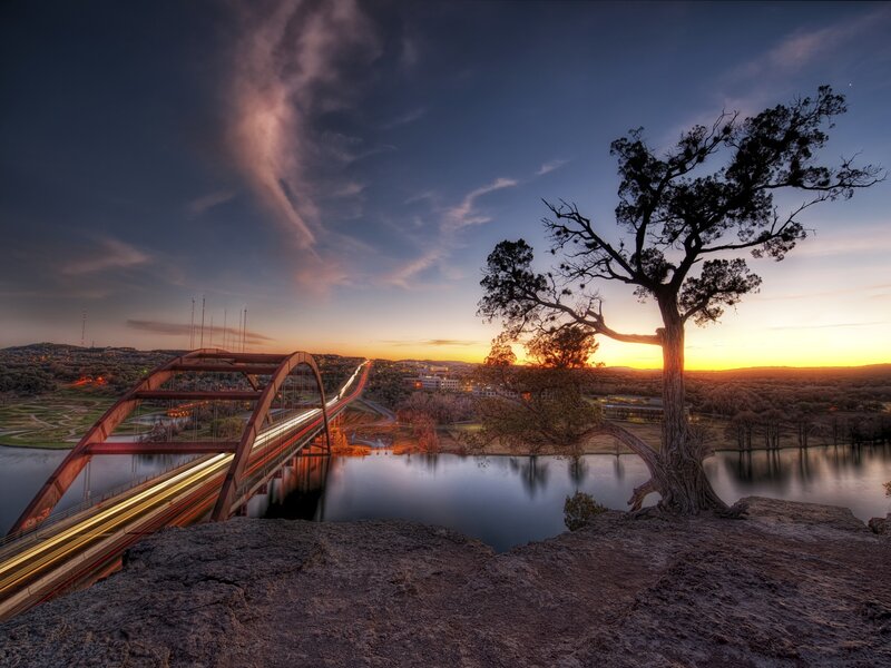 Sunset over a bridge and river
