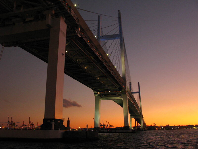 sunset over a cable-stayed bridge