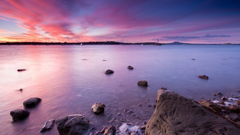 sunset over a calm bay