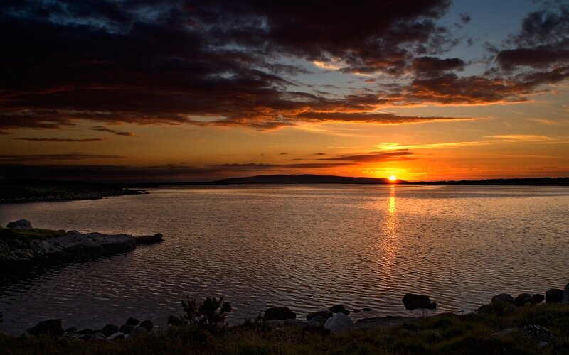 sunset over a calm bay