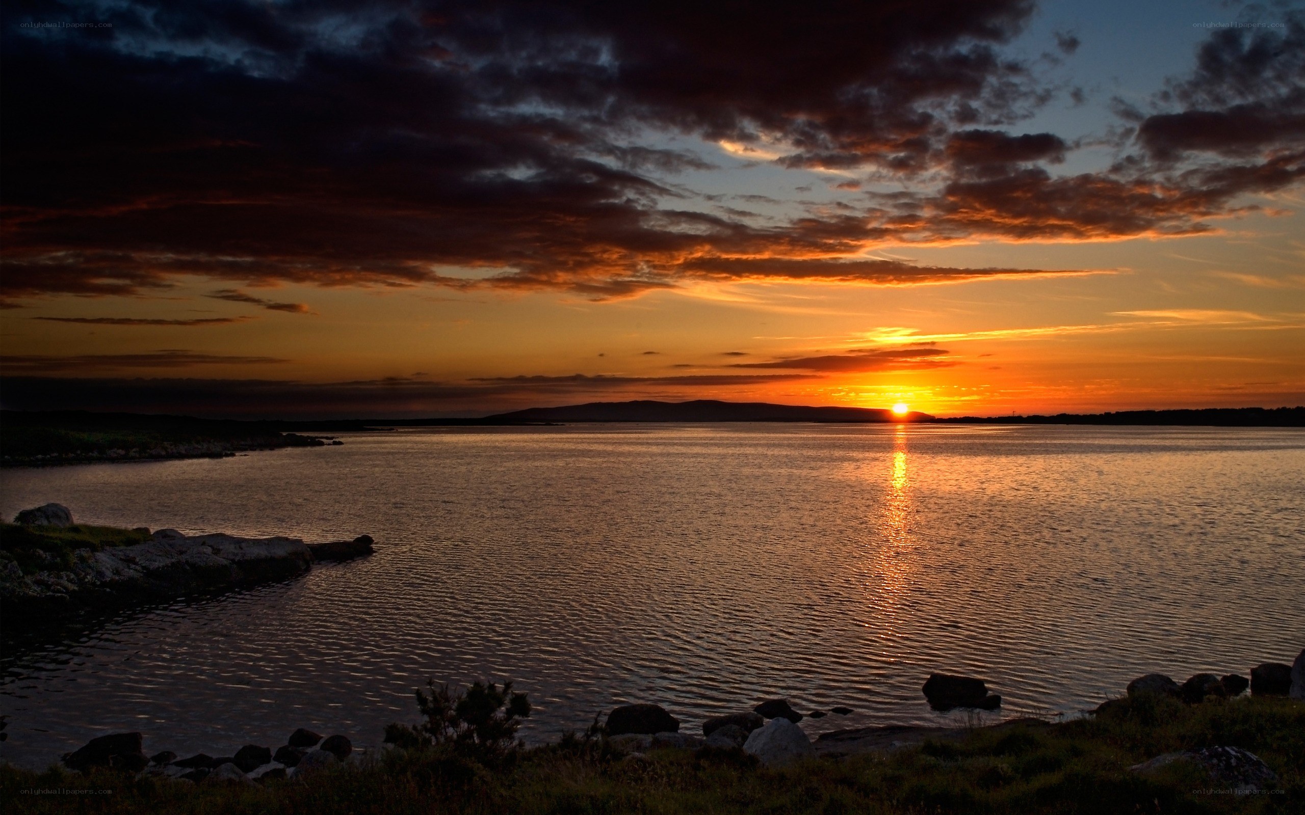 sunset over a calm bay