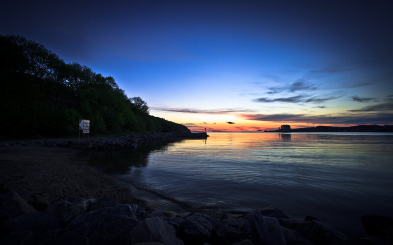sunset over a calm bay