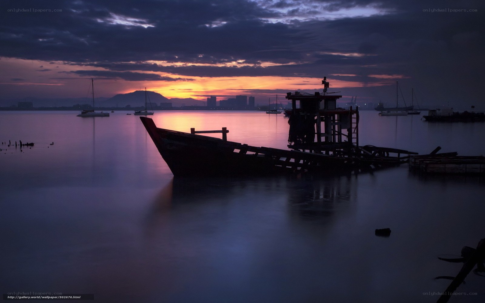 Sunset over a calm harbor