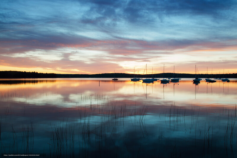 Sunset over a calm harbor
