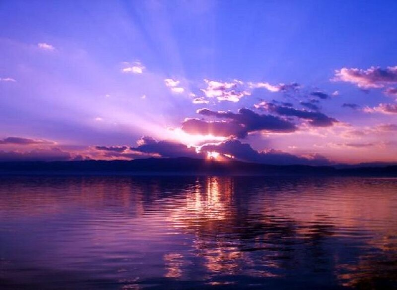 Sunset over a calm lake
