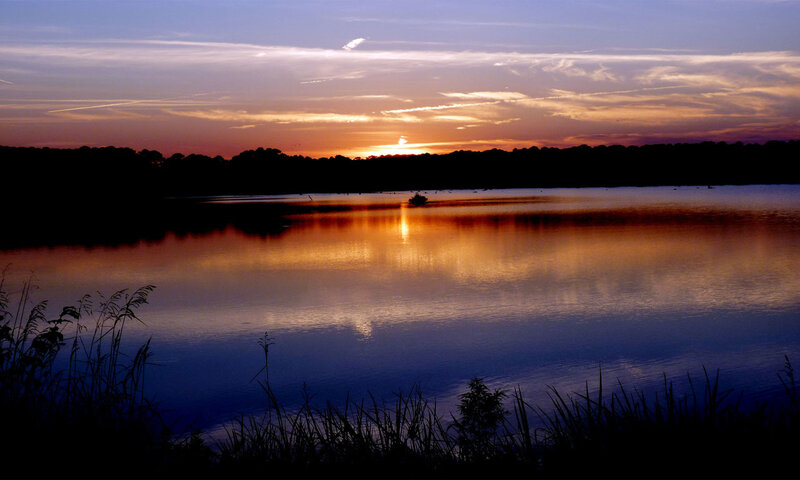 sunset over a calm lake