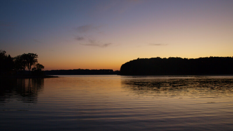 sunset over a calm lake