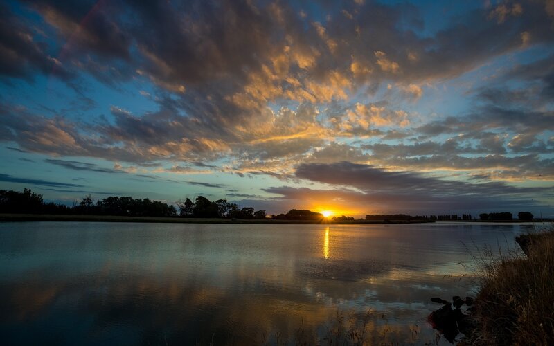 Sunset over a calm lake