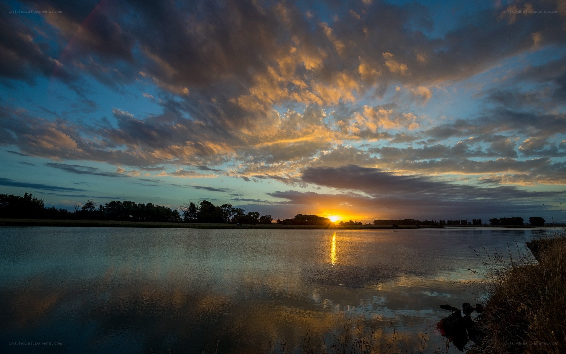 Sunset over a calm lake