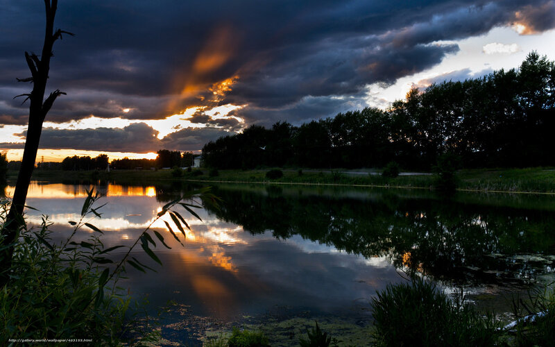 Sunset over a calm lake