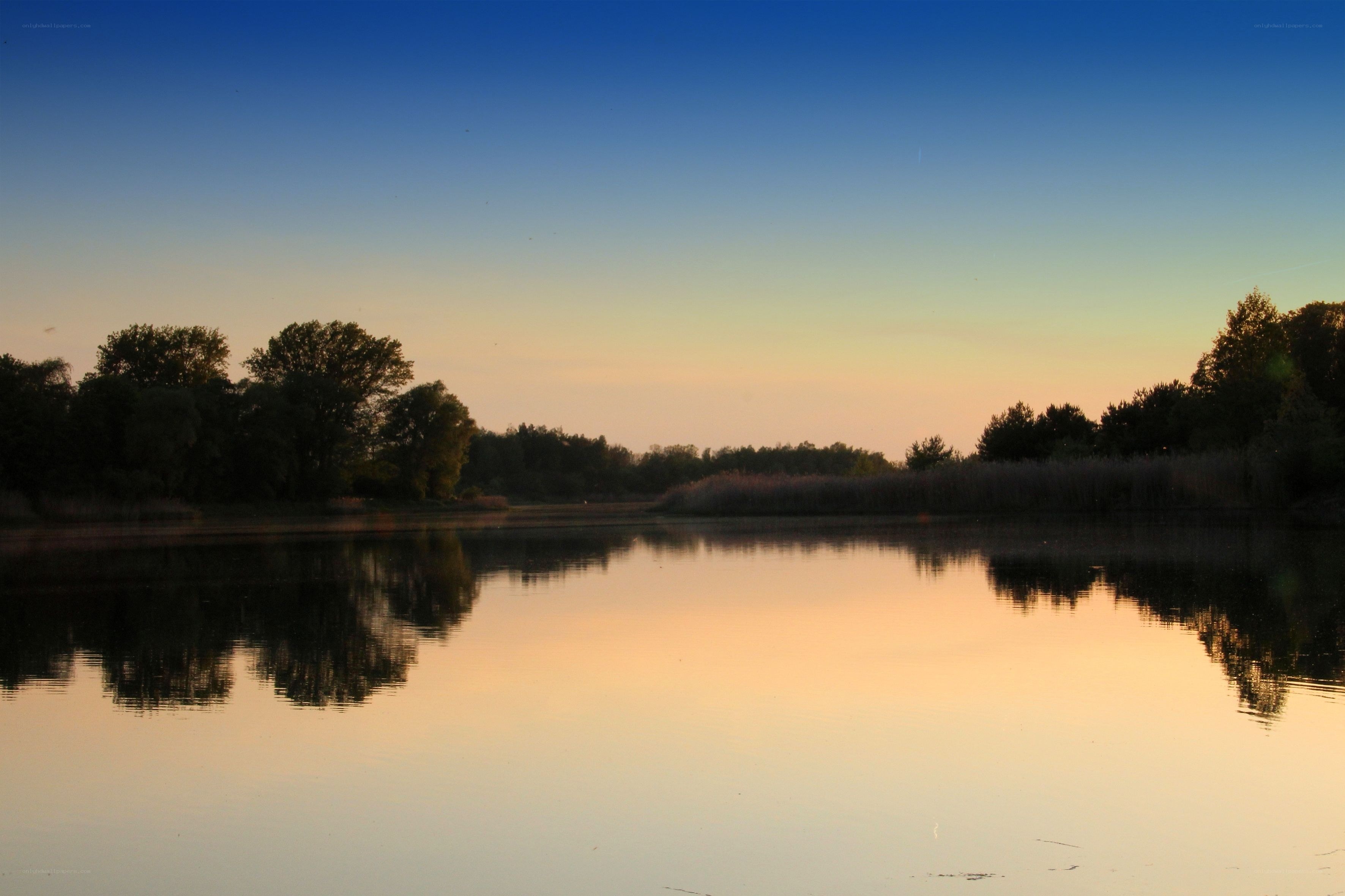 Sunset over a calm lake