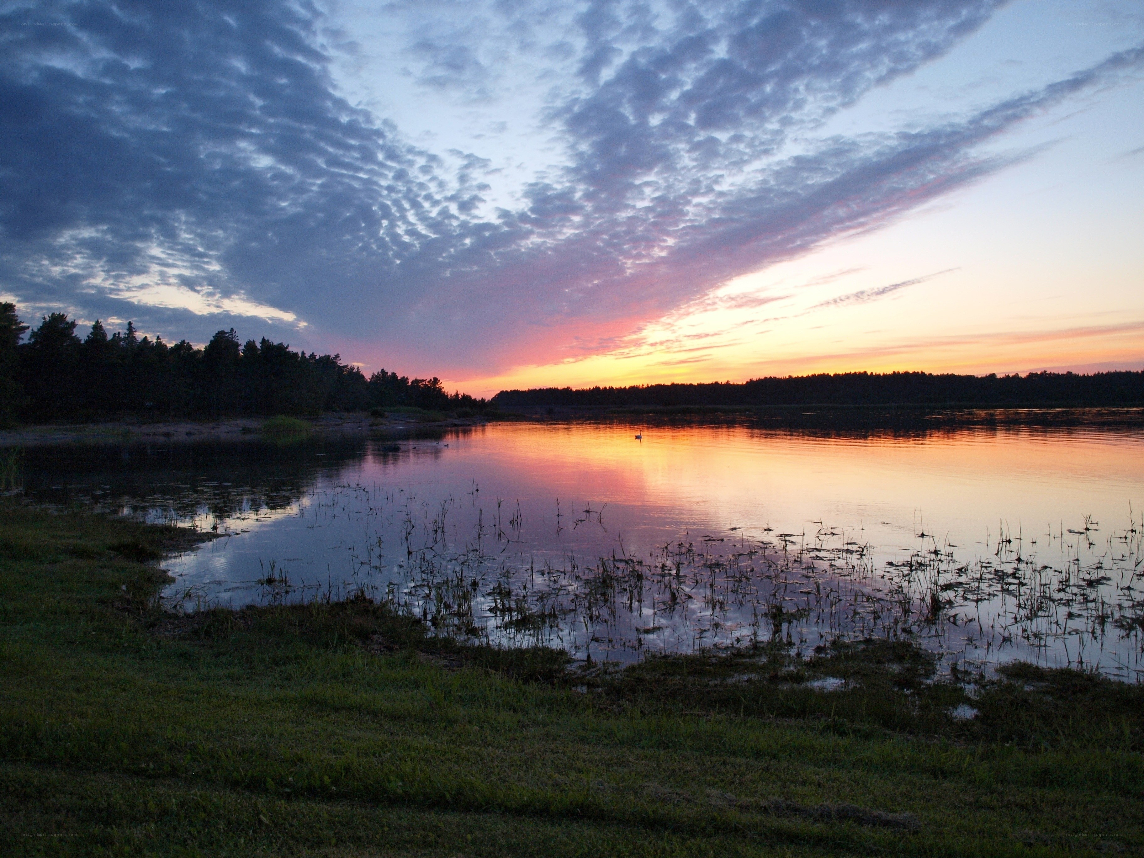 Sunset over a calm lake