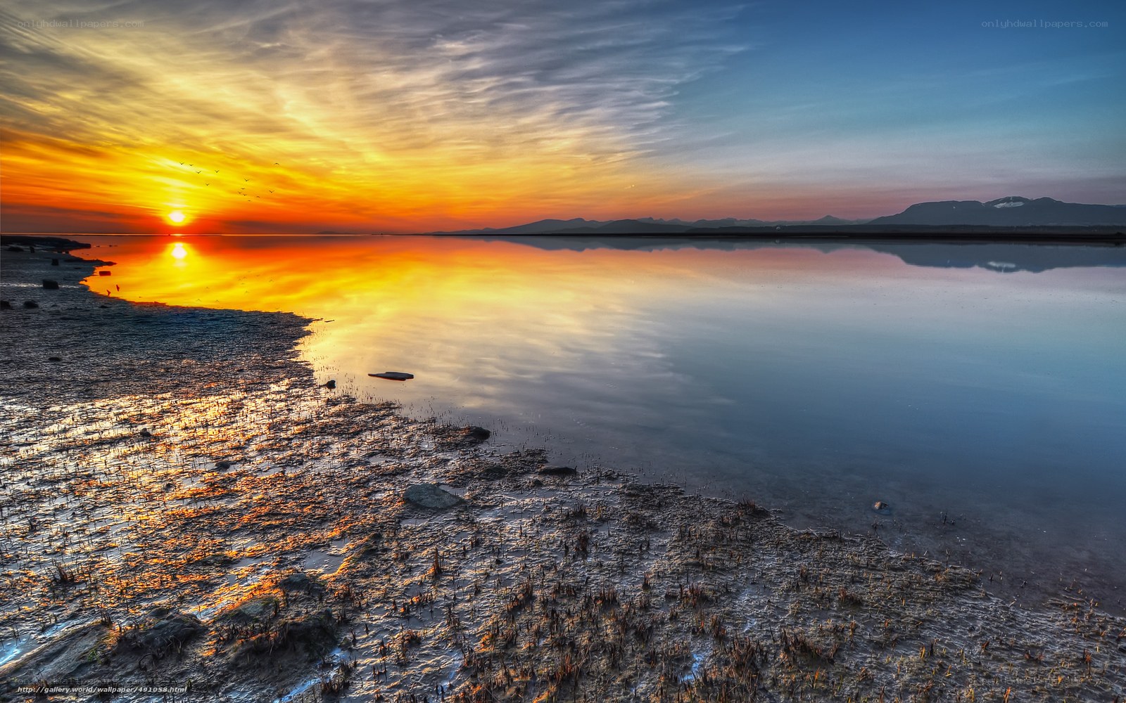 Sunset over a calm lake