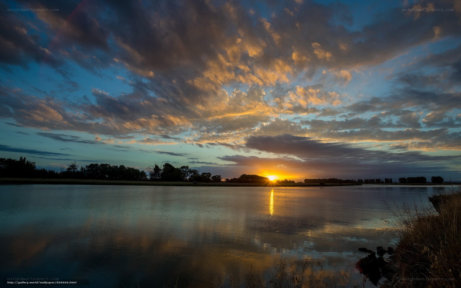 Sunset over a calm lake
