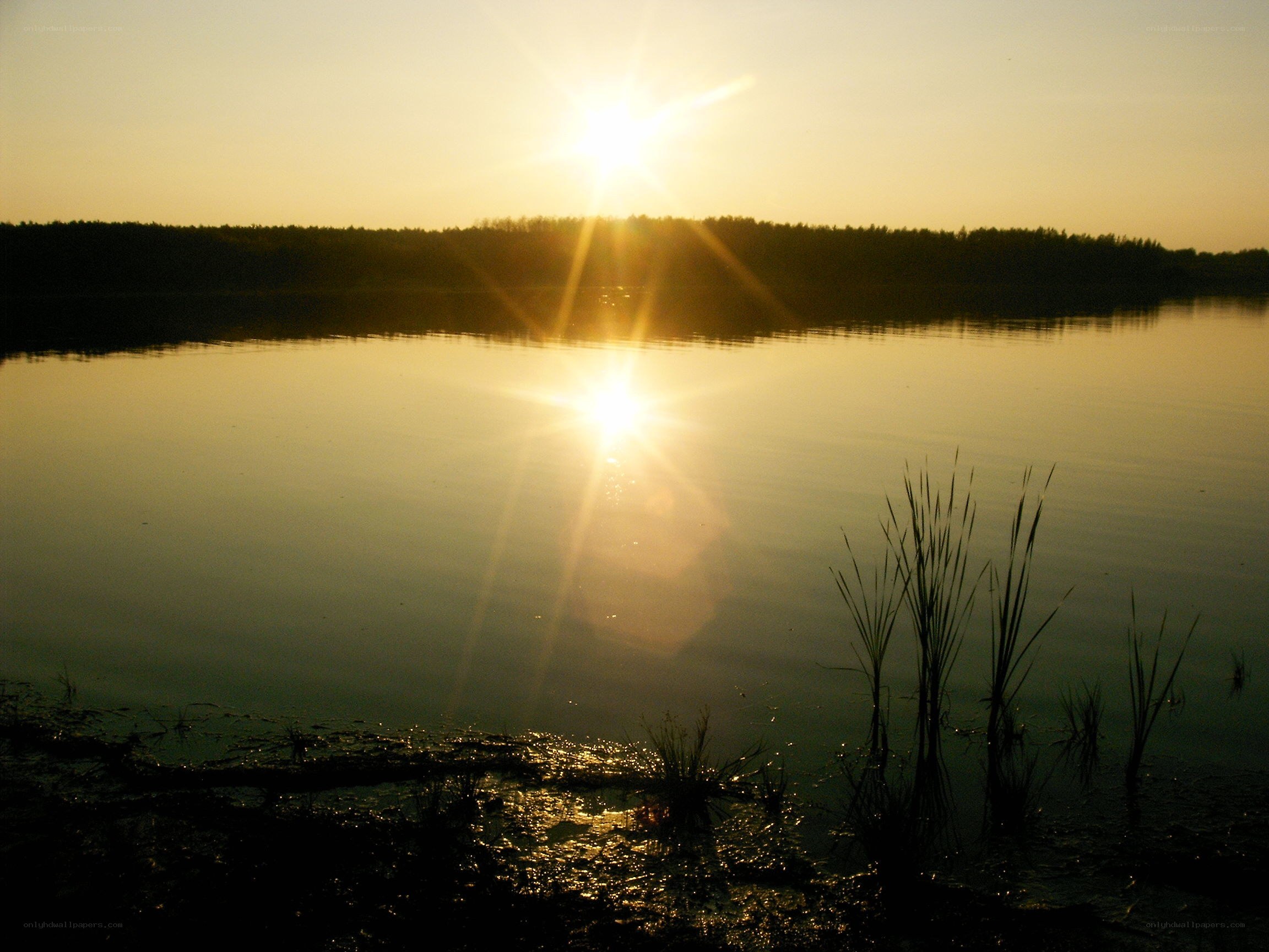 Sunset over a calm lake