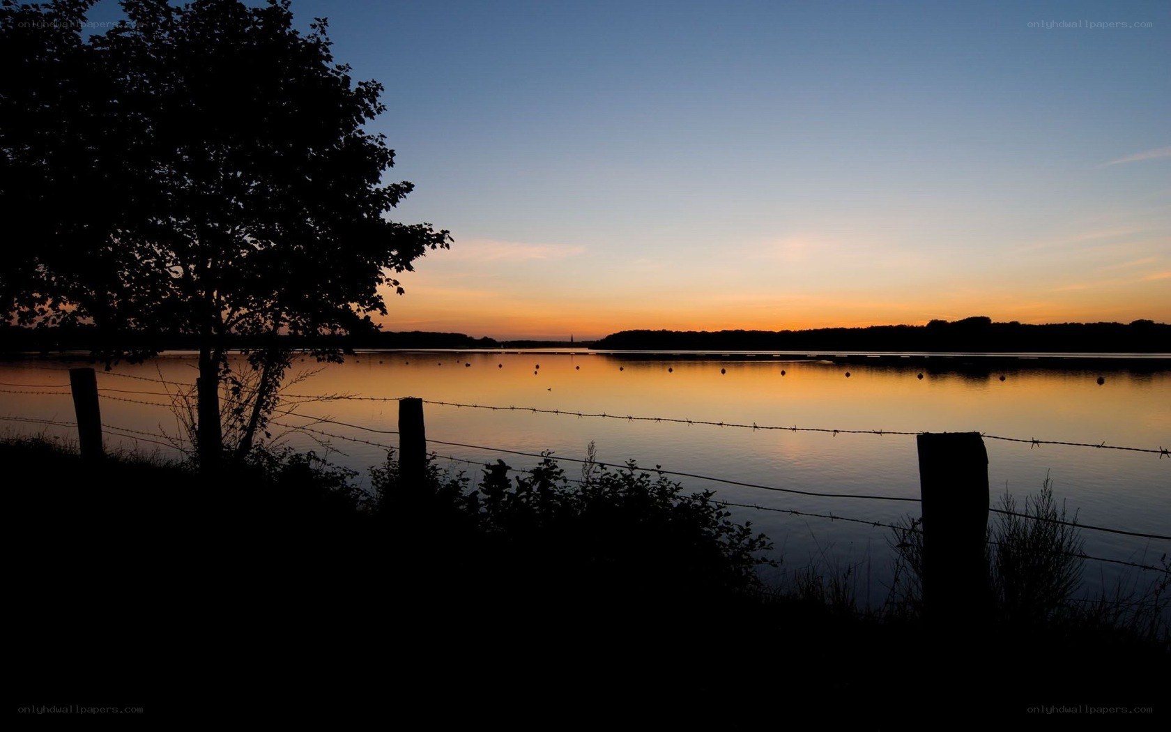Sunset over a calm lake
