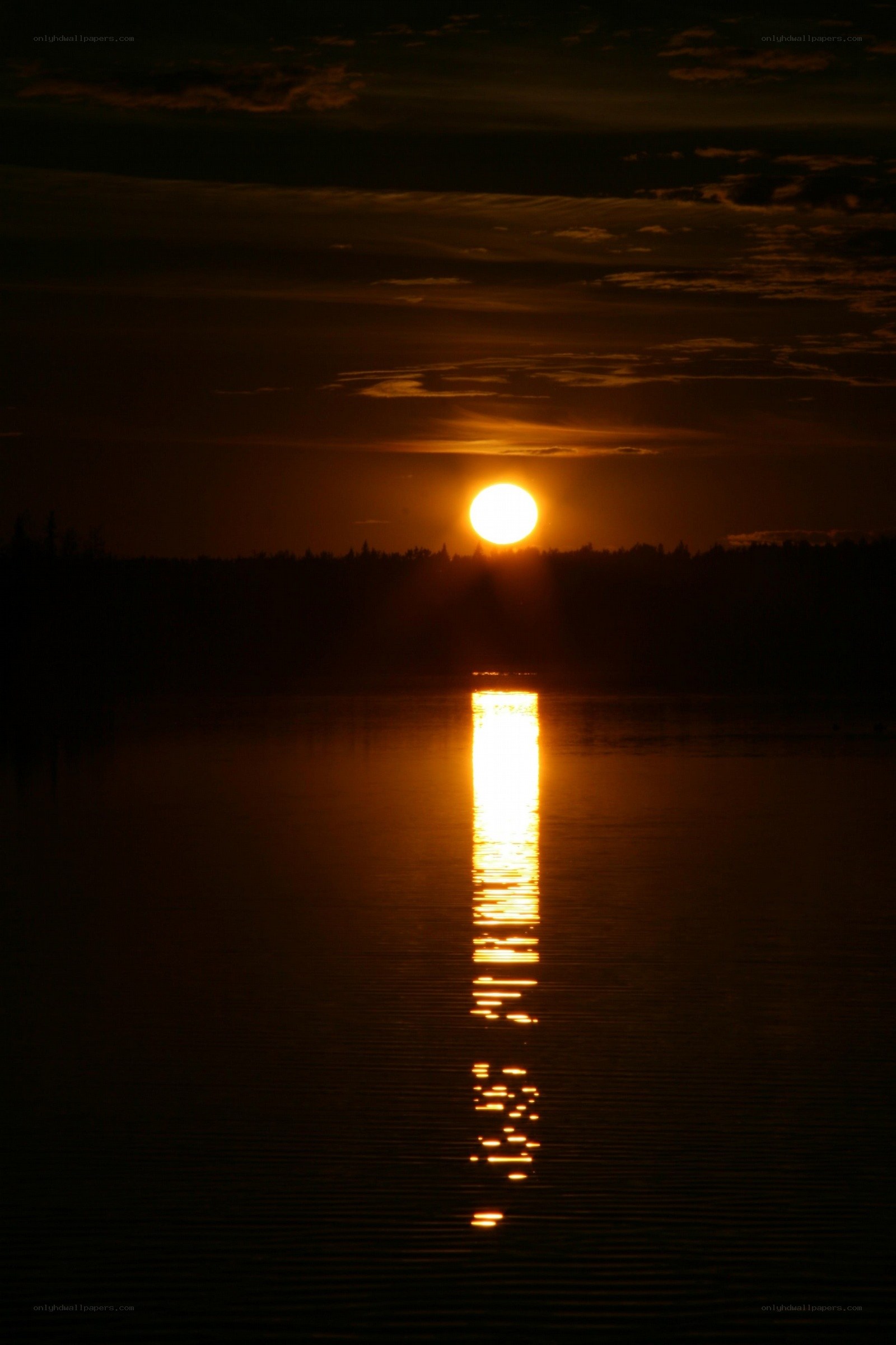 Sunset over a calm lake