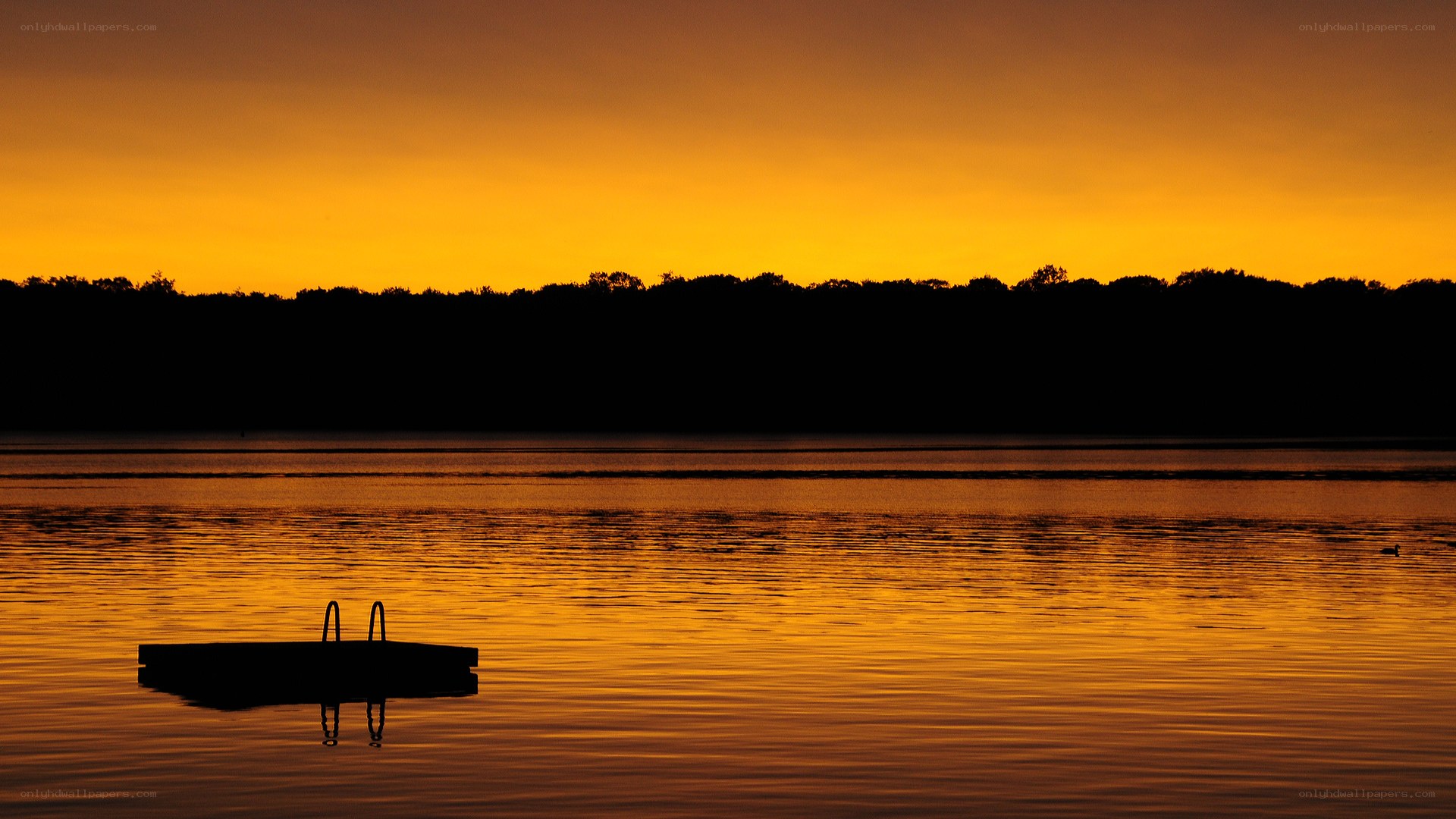 Sunset over a calm lake