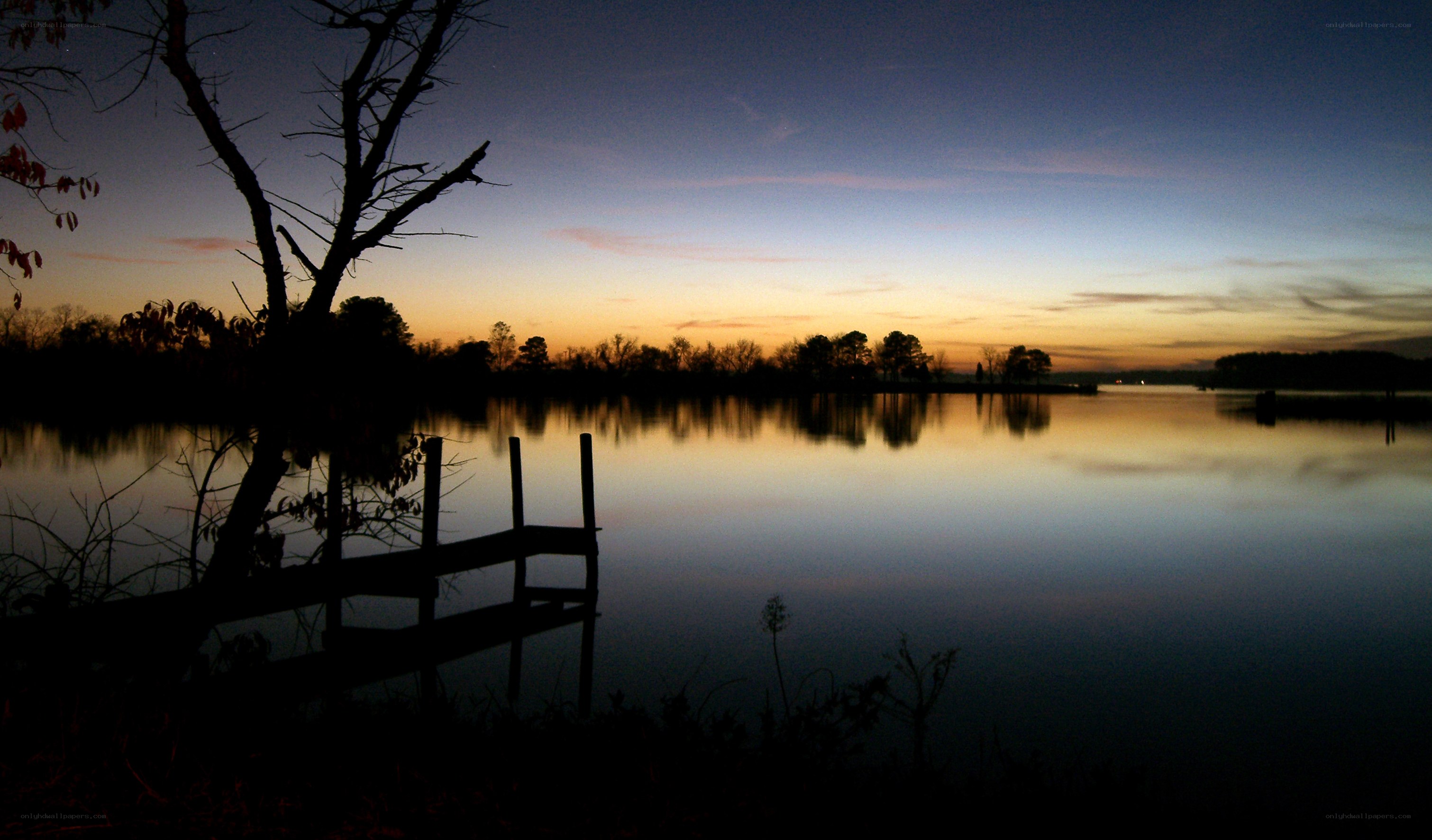 sunset over a calm lake