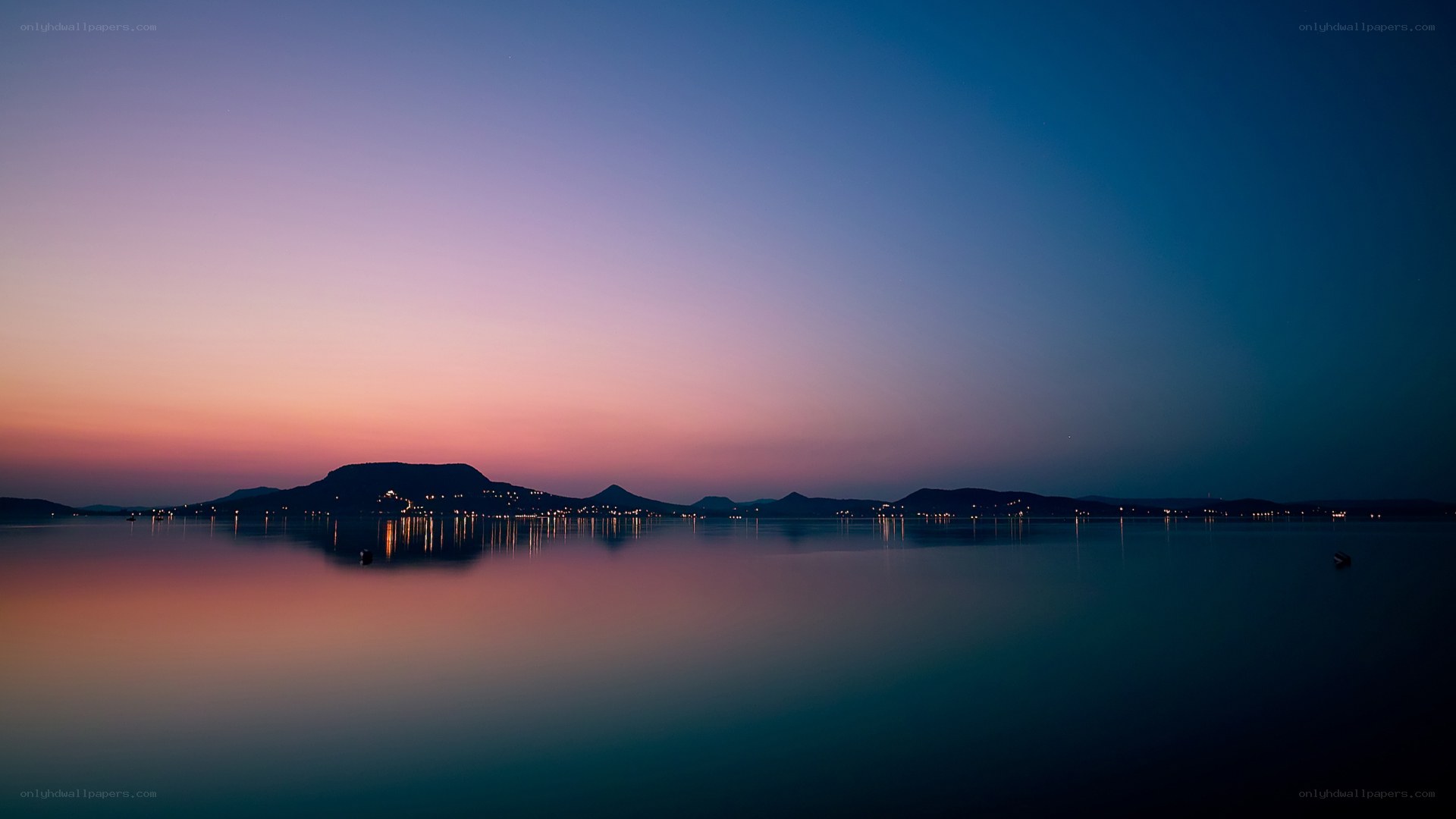 sunset over a calm lake