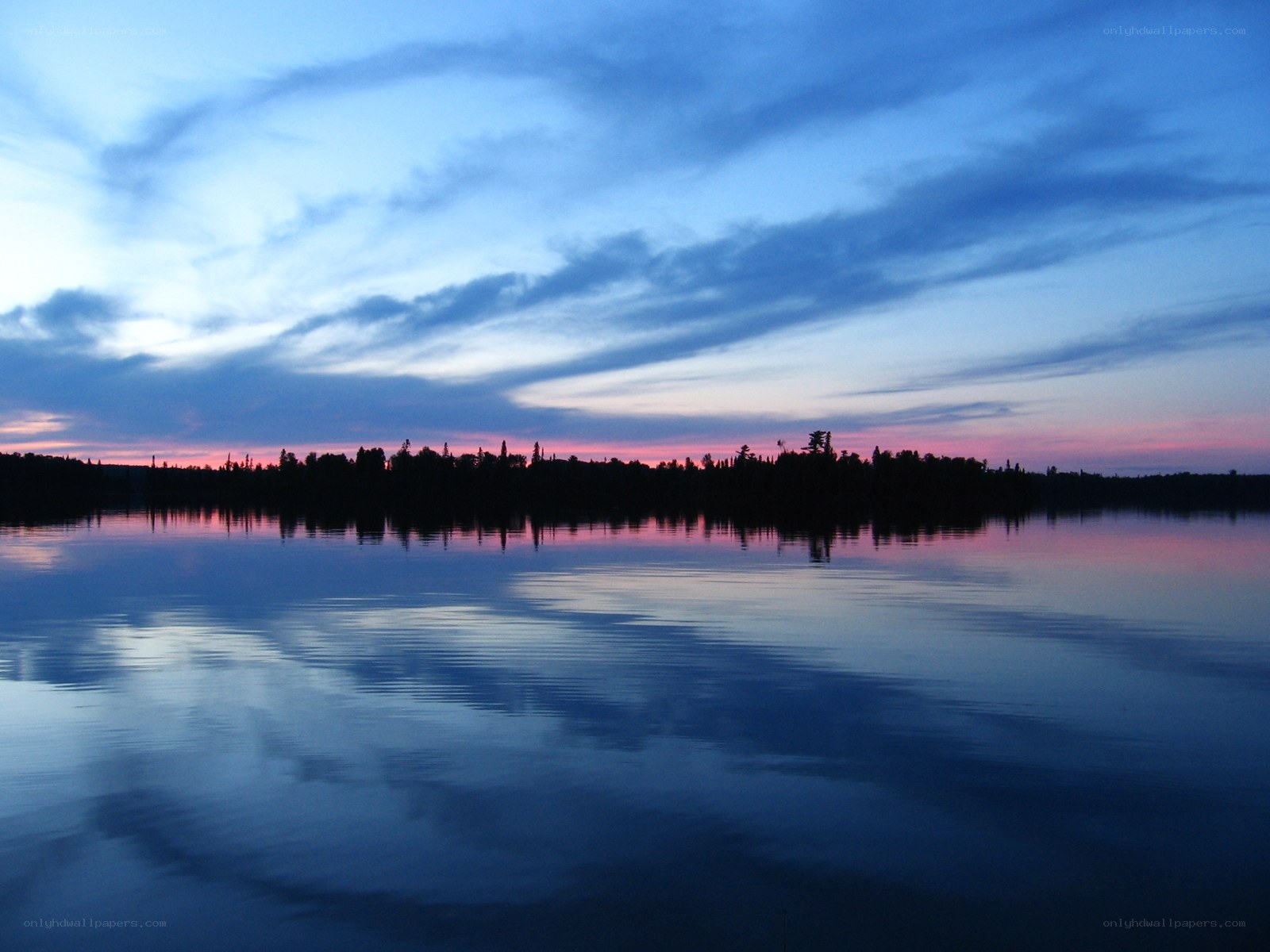 Sunset over a calm lake