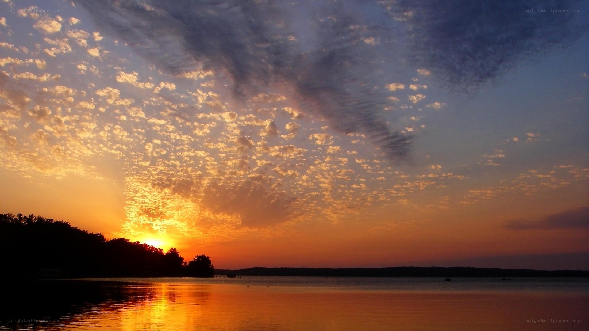 sunset over a calm lake