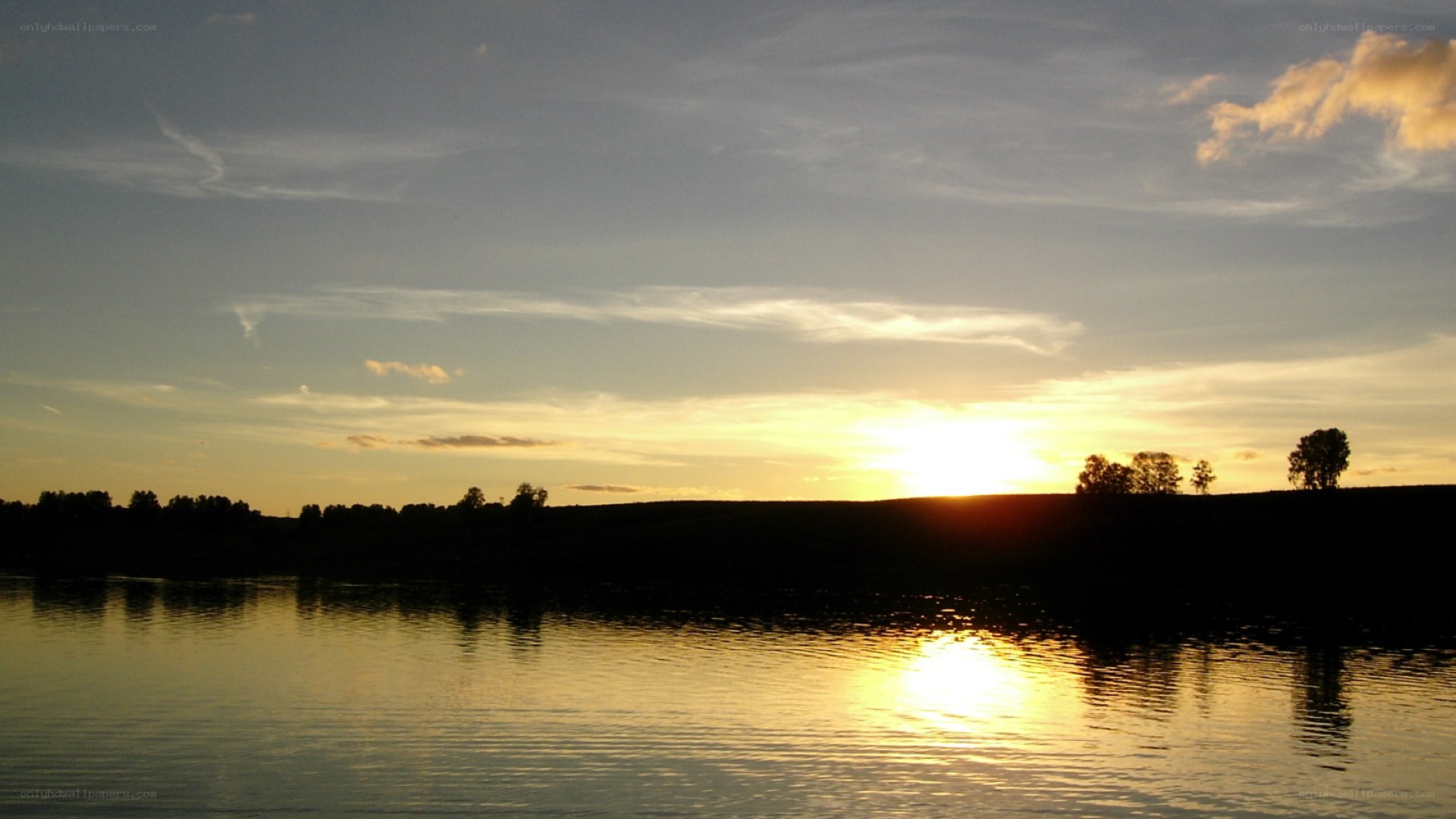 sunset over a calm lake