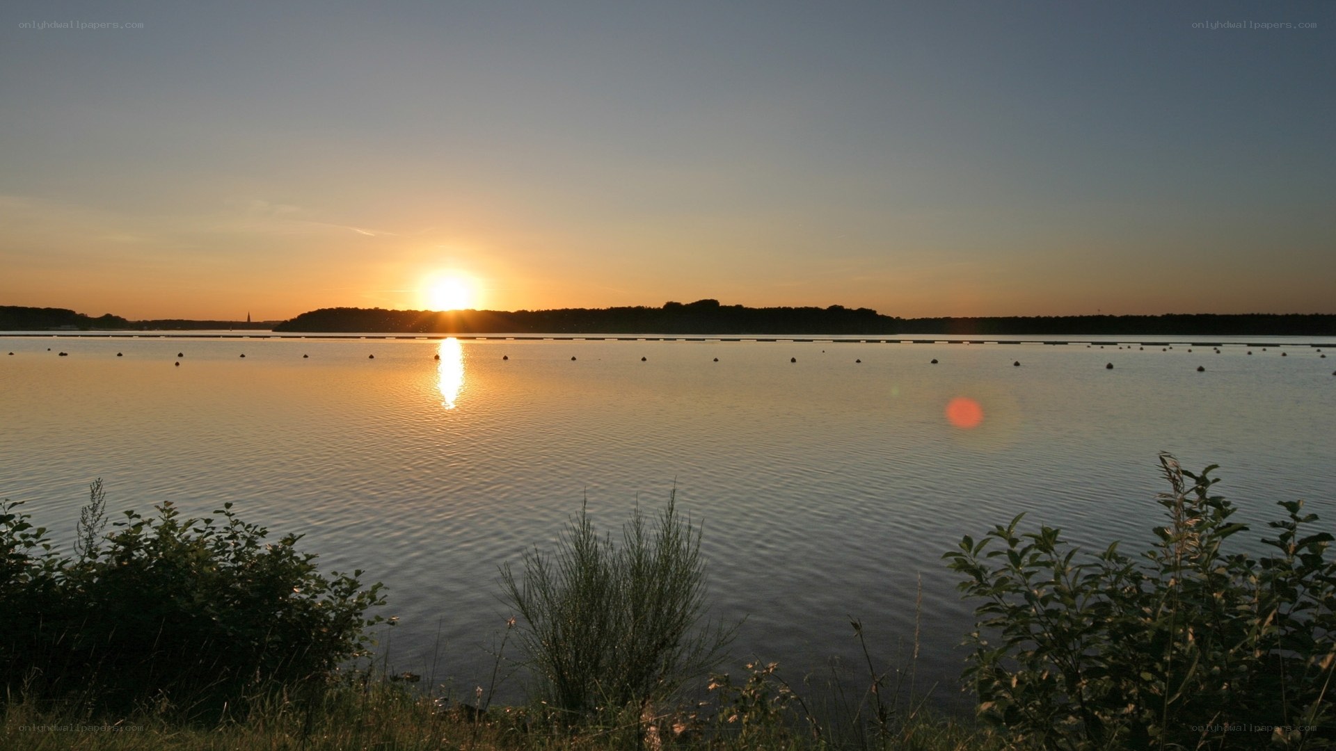 Sunset over a calm lake