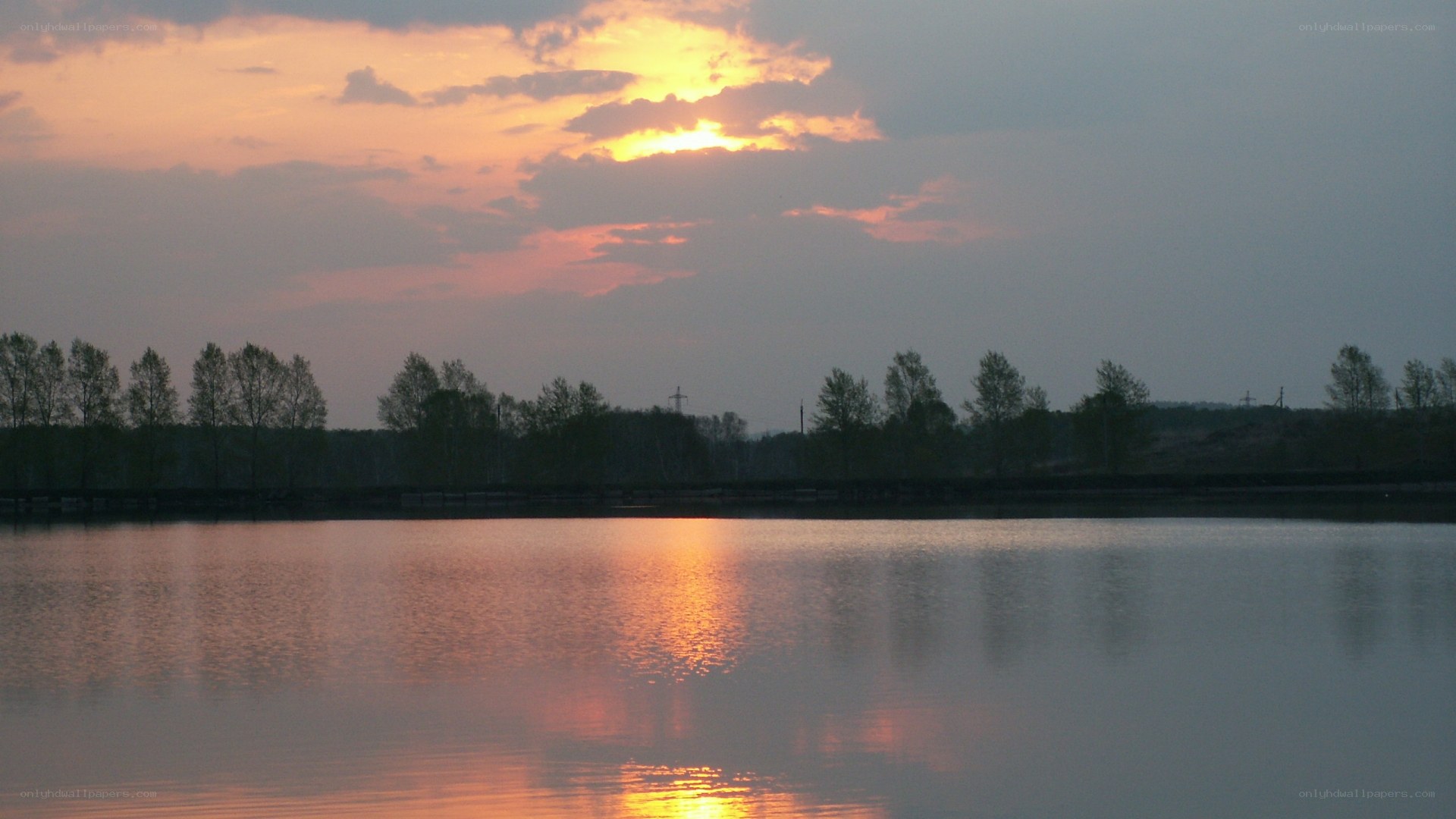 sunset over a calm lake