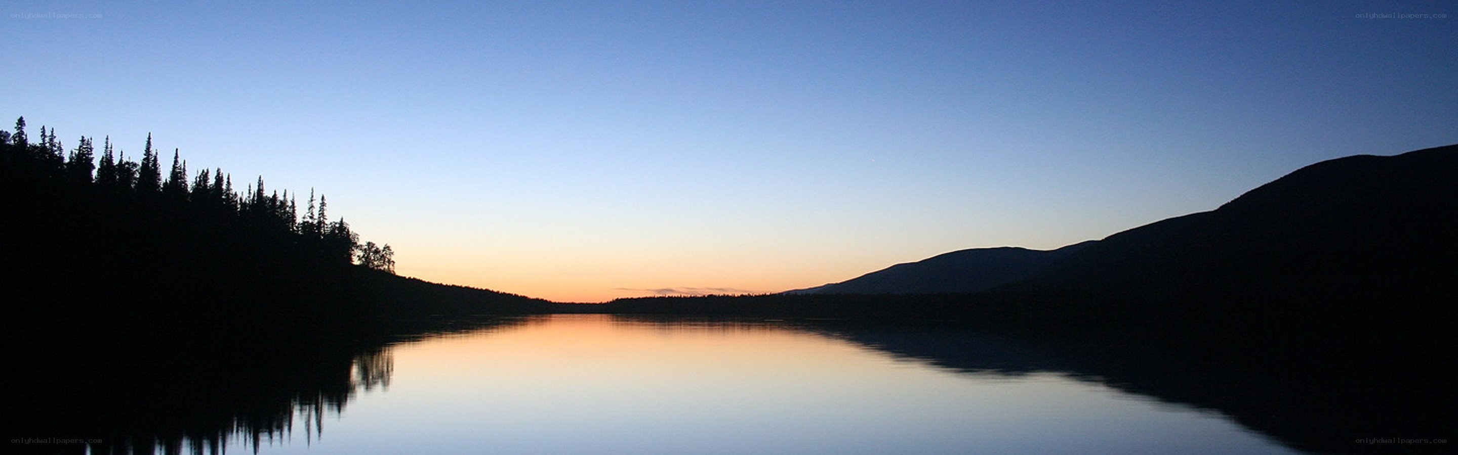 sunset over a calm lake