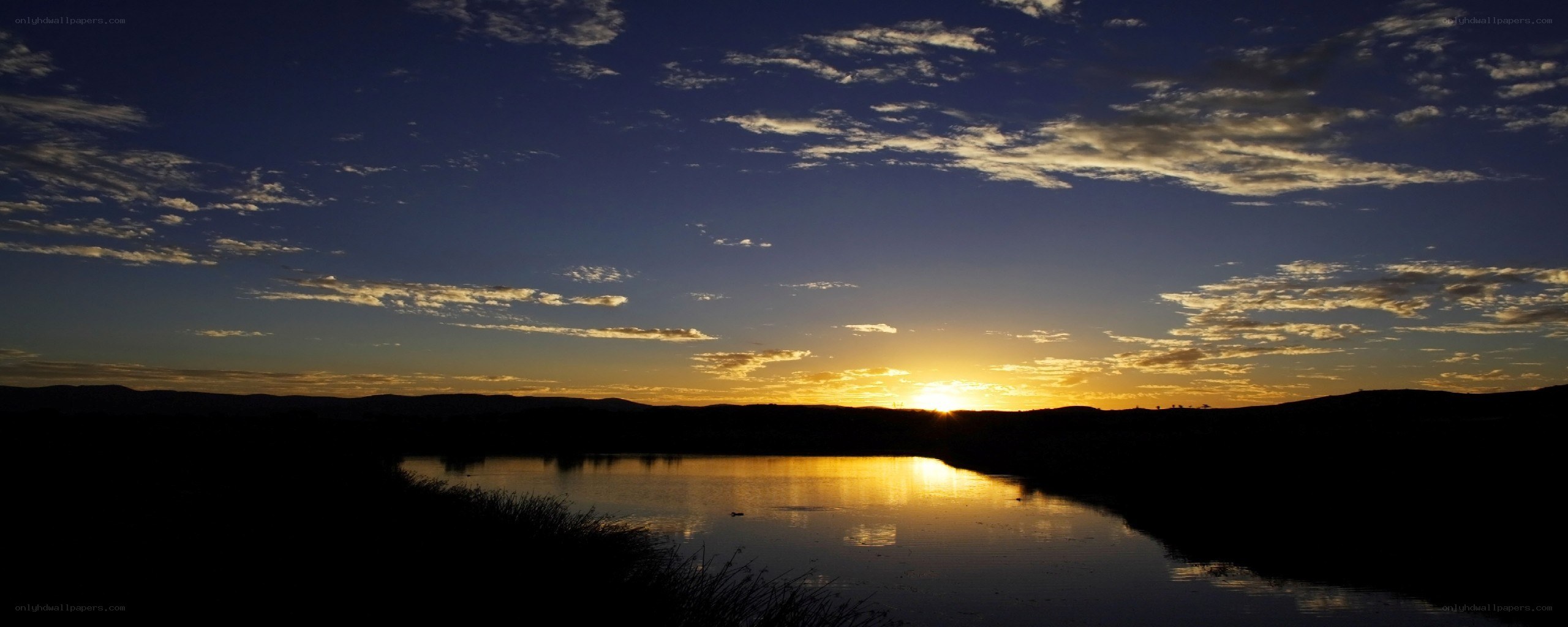 Sunset over a calm lake