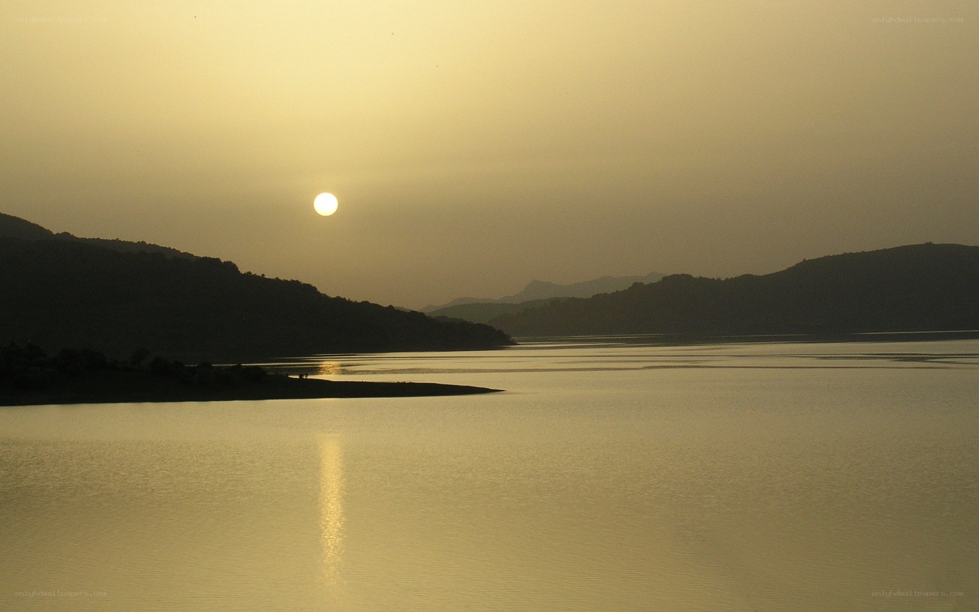 Sunset over a calm lake