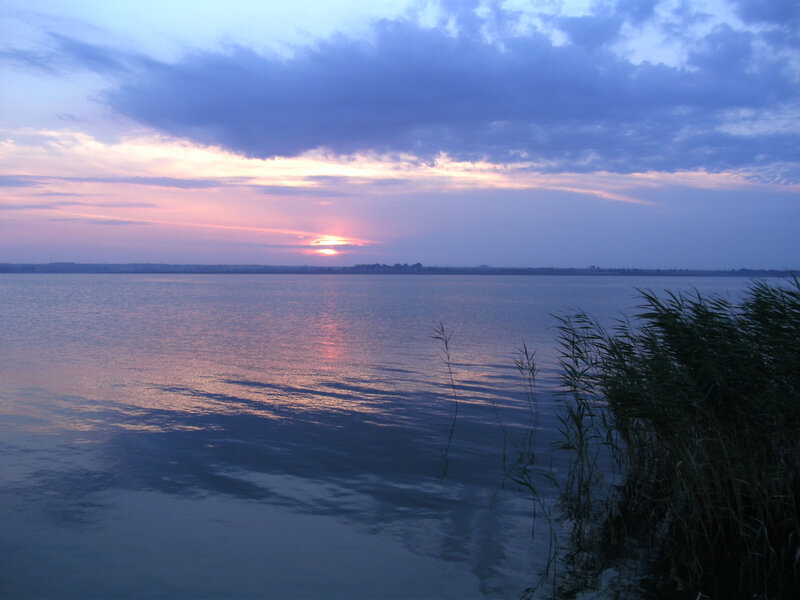 Sunset over a calm lake