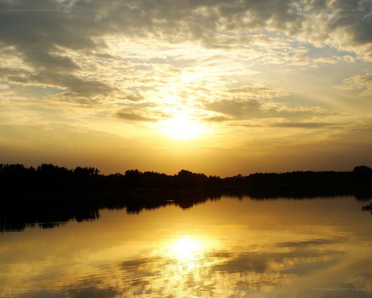 Sunset over a calm lake