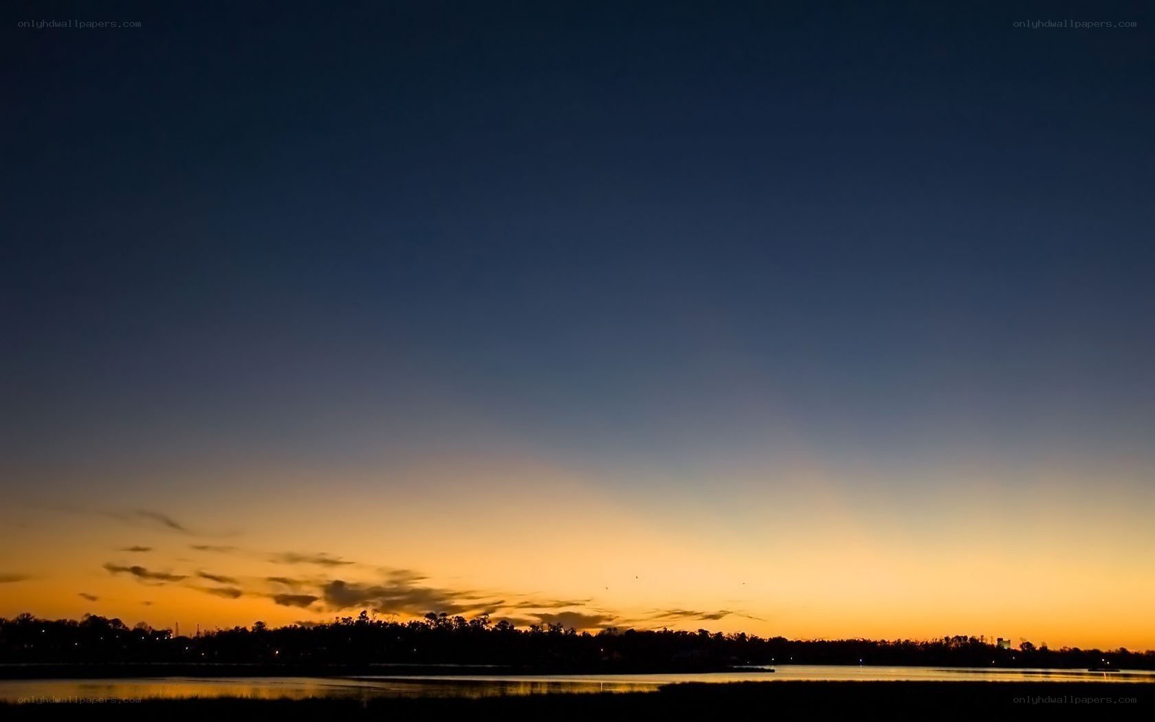 sunset over a calm lake