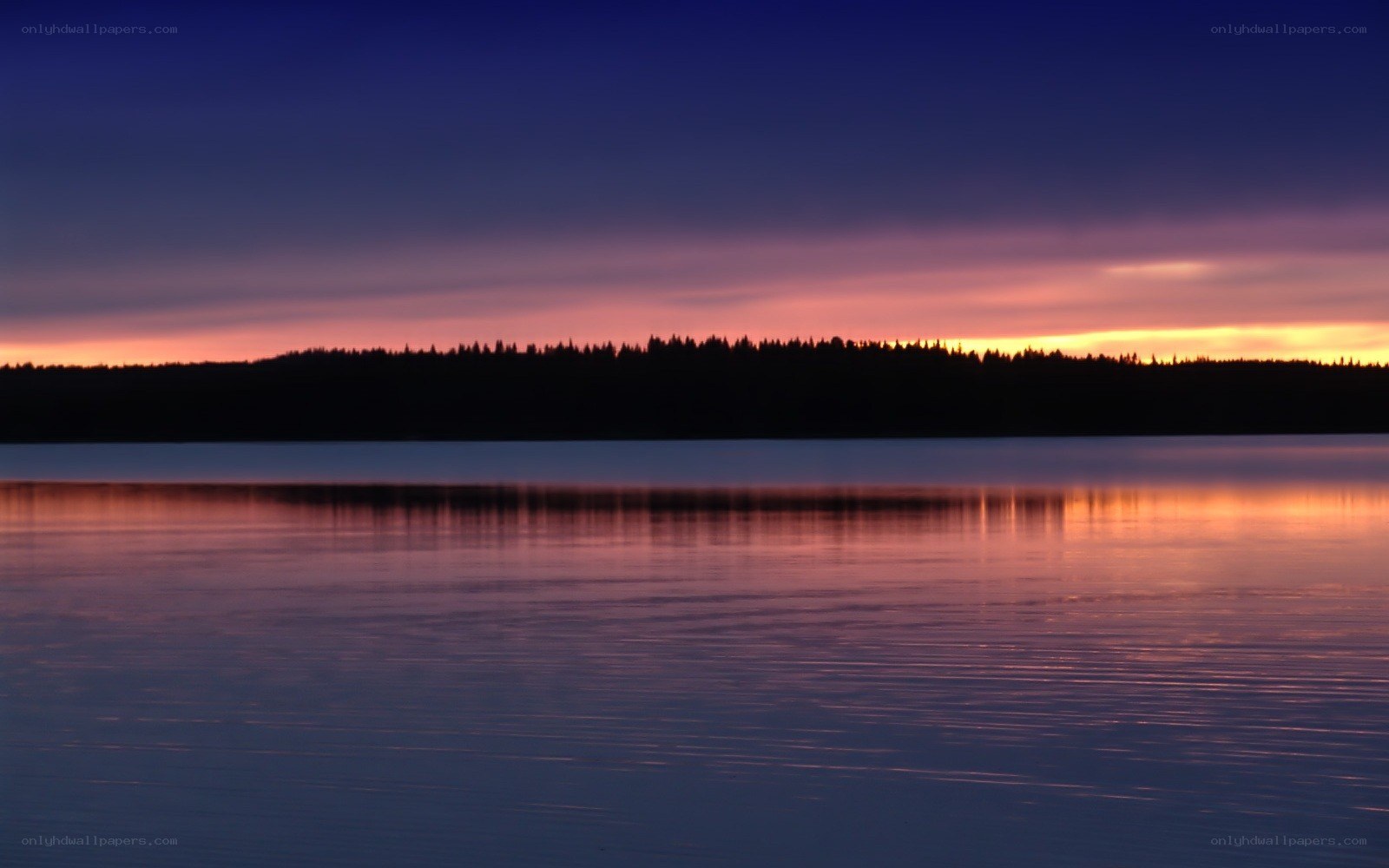 sunset over a calm lake