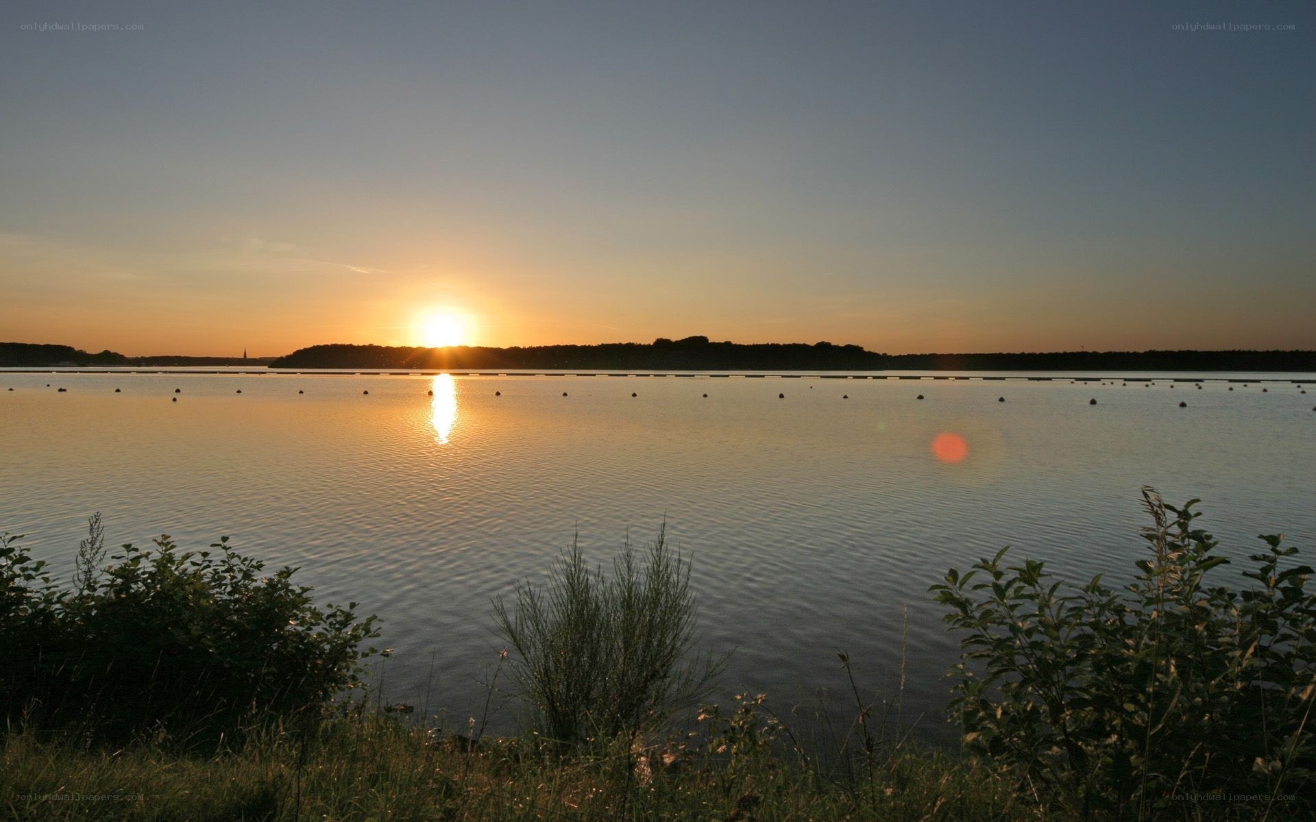 Sunset over a calm lake