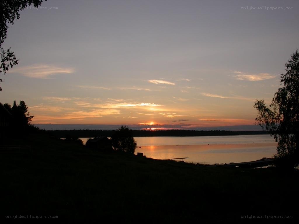 sunset over a calm lake