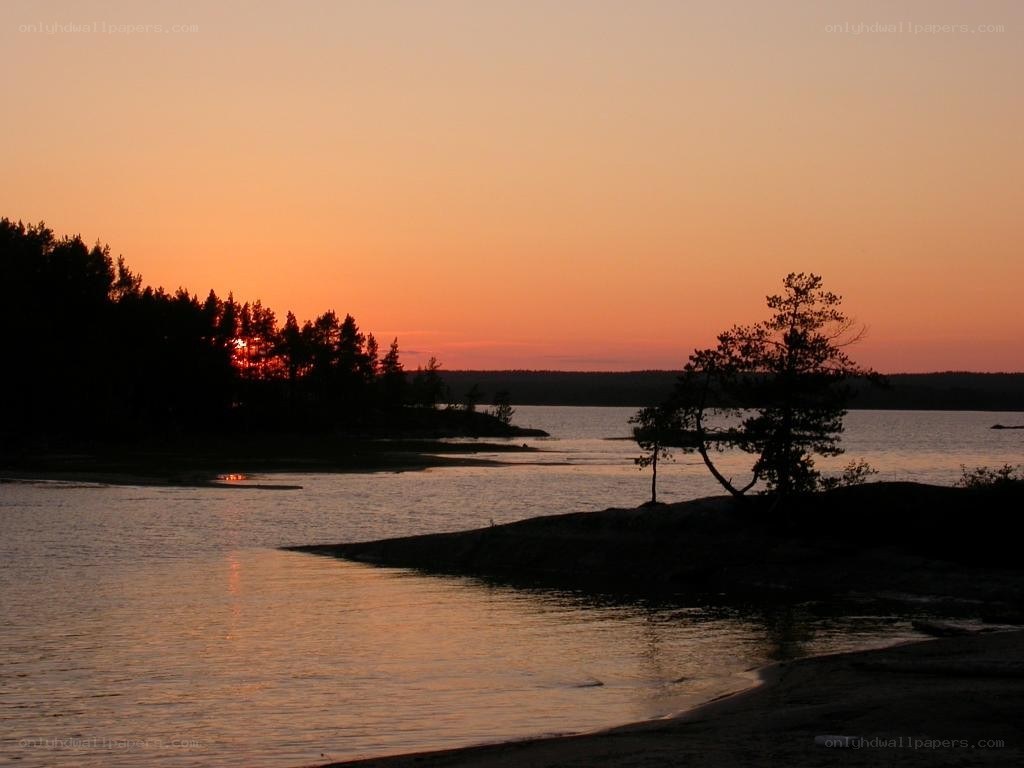sunset over a calm lake