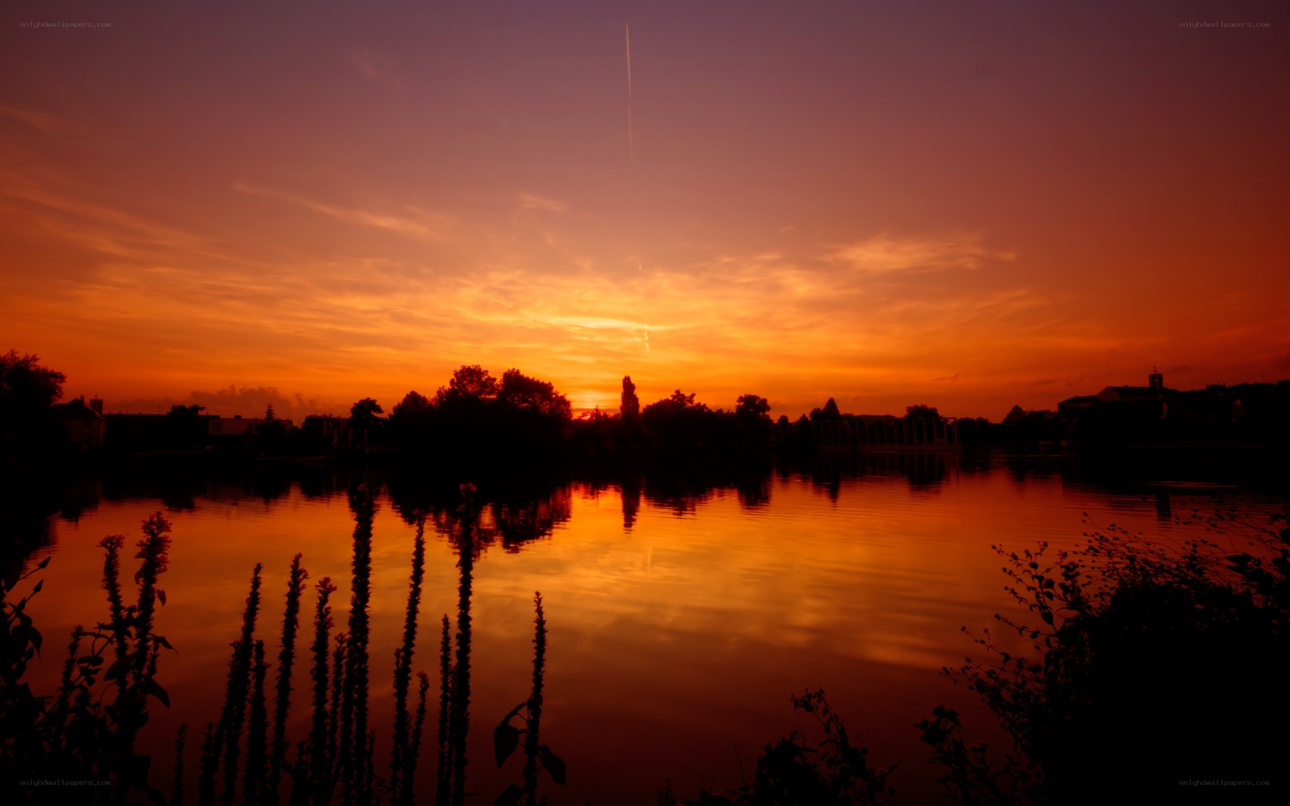 sunset over a calm lake