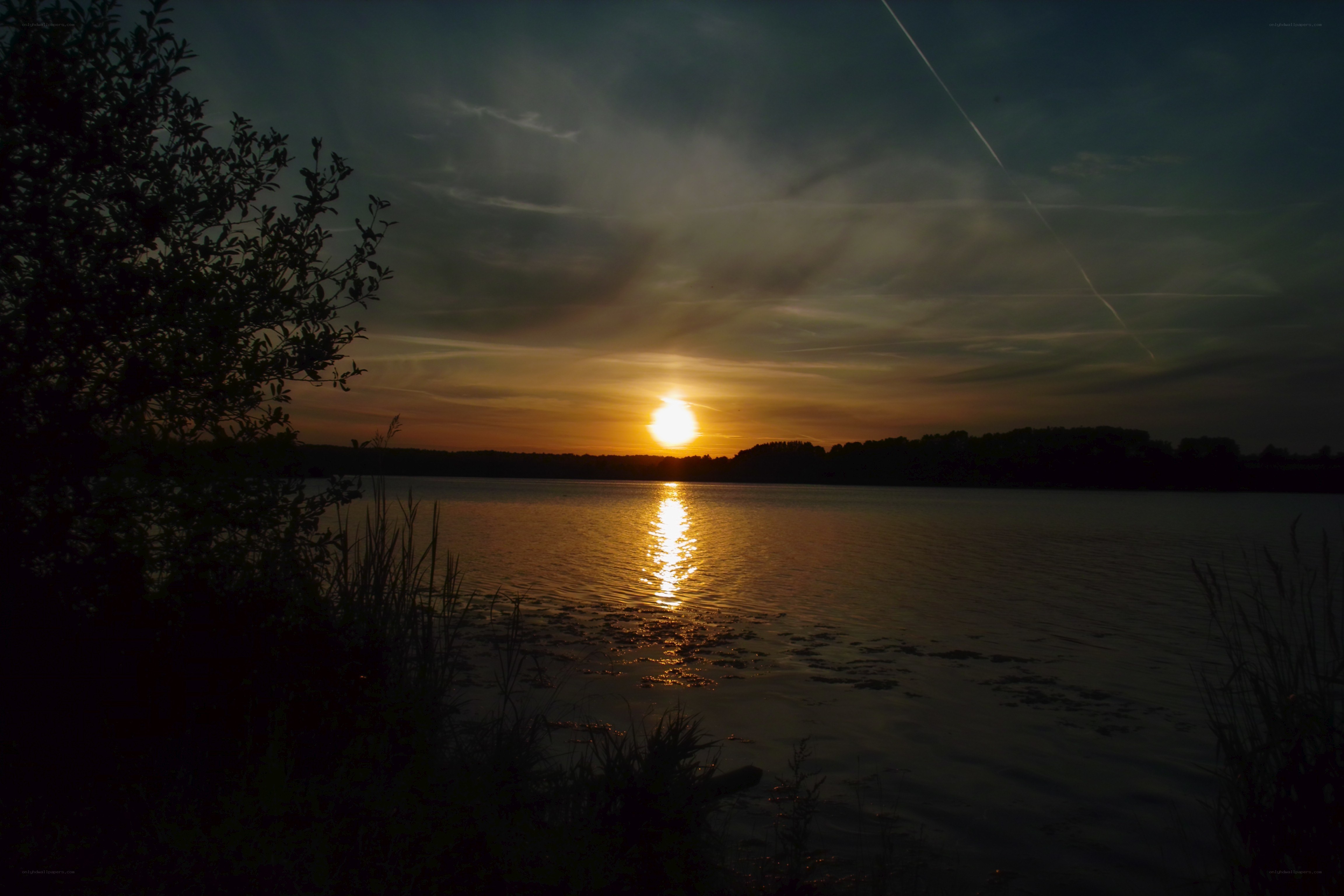 Sunset over a calm lake